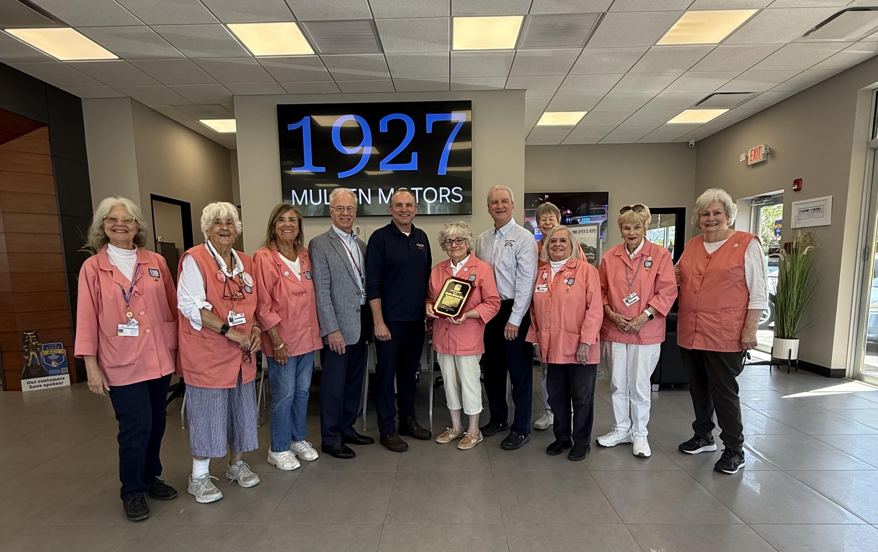 Plaque presentation to Mullen Motors