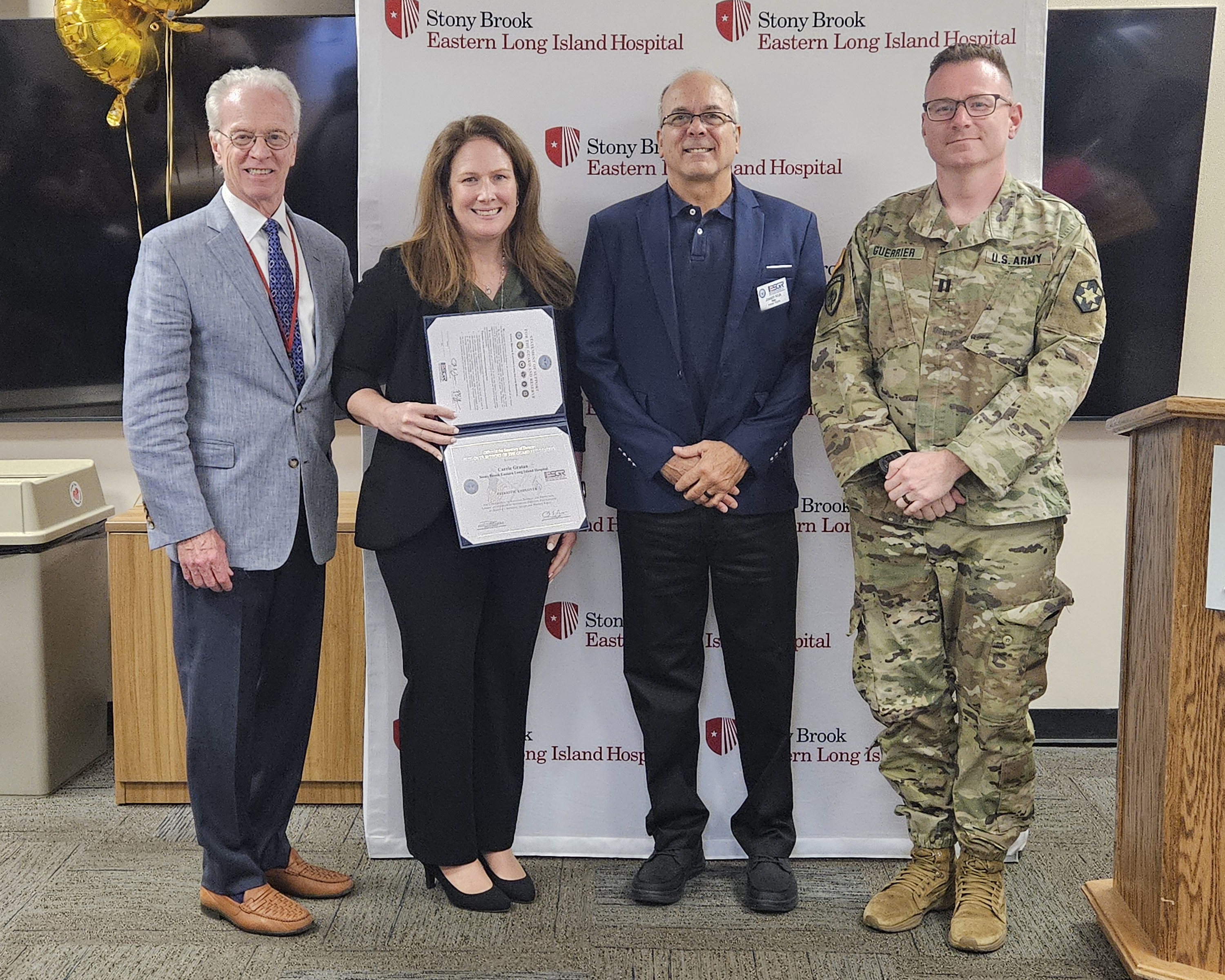 Paul J. Connor III, Chief Administrative Officer SBELIH; Carrie Grattan, BSN, RN, Vice President of Nursing Operations; Joseph Kruk, CMSgt, USAF (Ret.), ESGR Volunteer, New York; and Russell Guerrier, RN, Captain US Army.