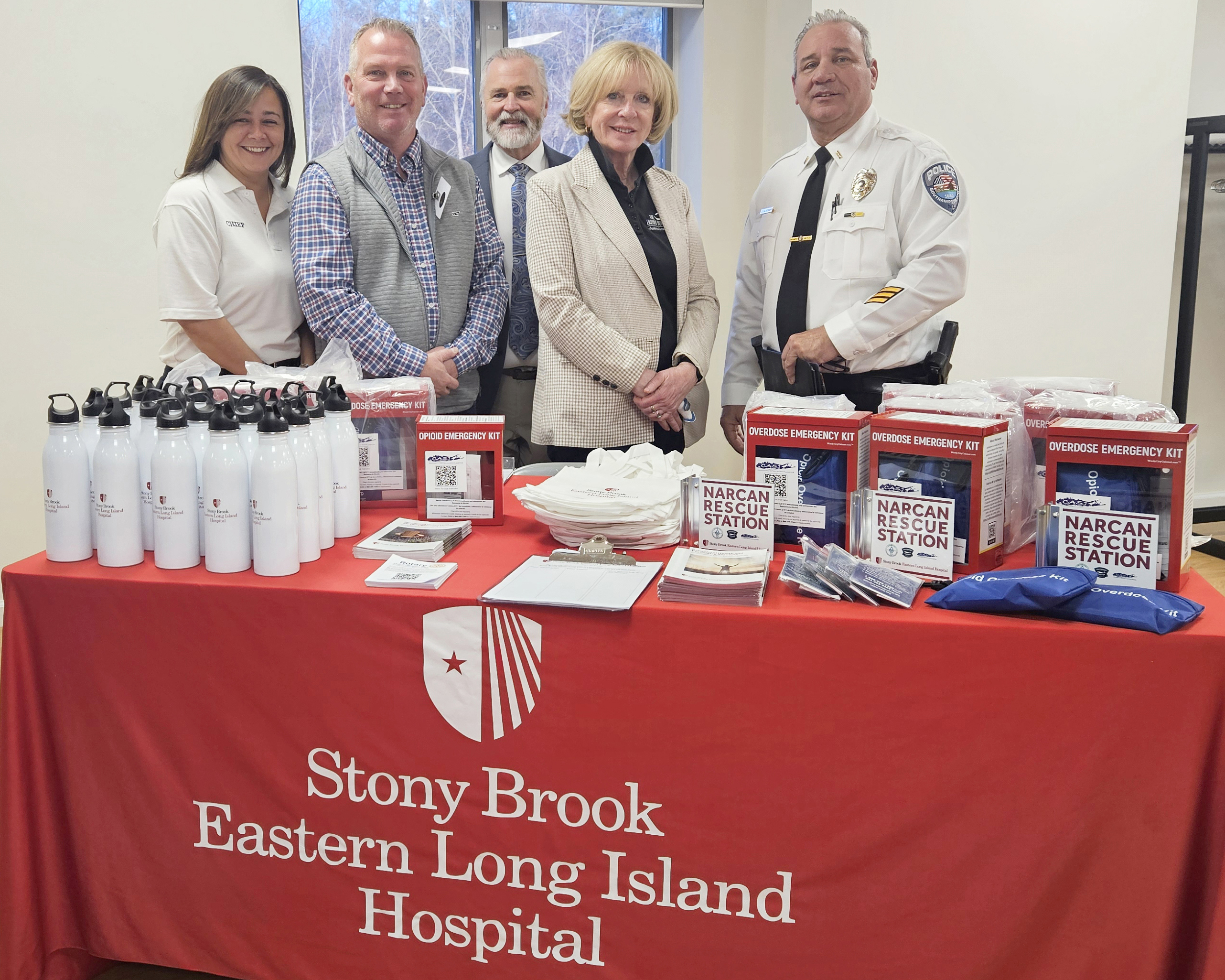 Officials with a display of narcan rescue program supplies